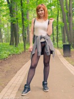 Jeny Smith in the park in seamless pantyhose