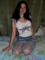 Young amateur girl in blue patterned pantyhose flash her lady bits